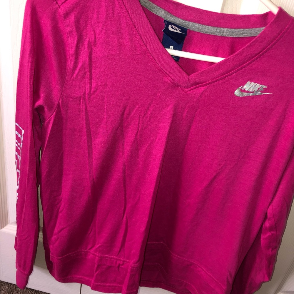 Cute Nike top with silver arm detail